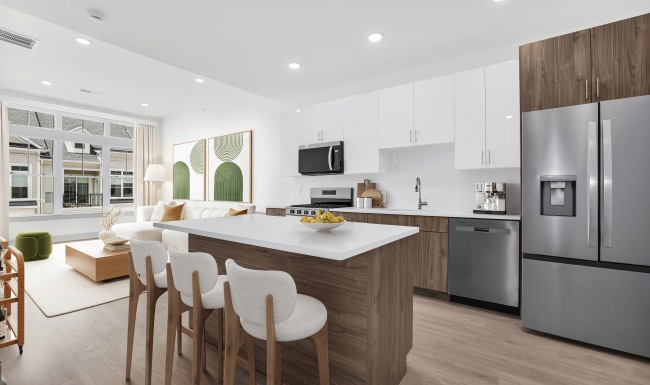 Spacious kitchen with island and bar stools