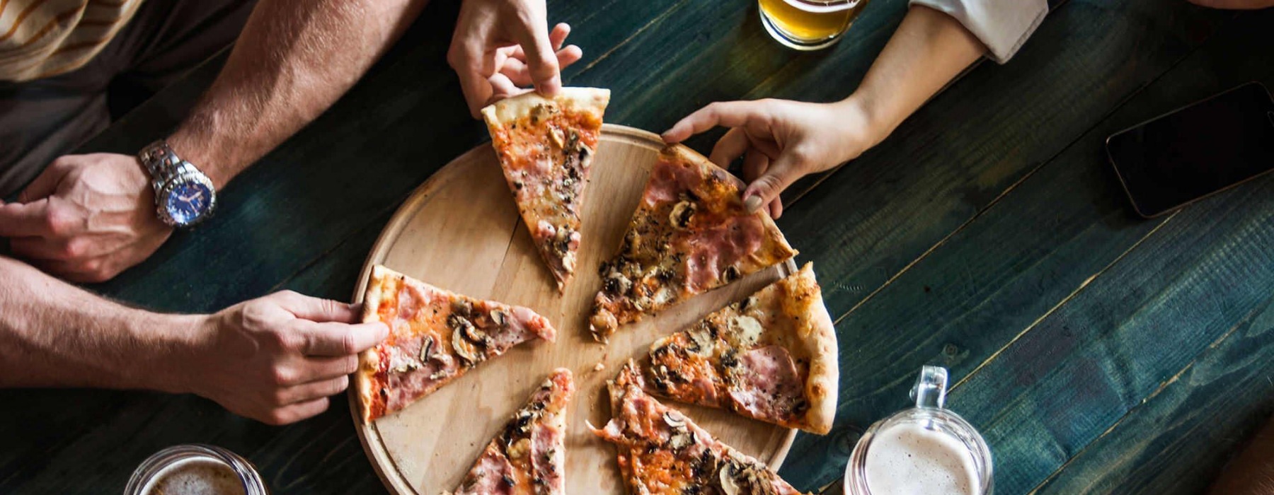 friends having pizza together